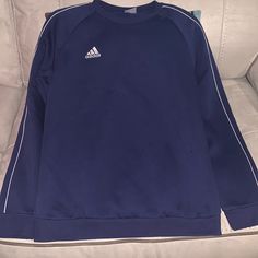 Navy Blue Crew Neck Adidas Sweatshirt With White Stripe On Sleeves. Very Slightly Used- Looks And Feels Brand New. No Flaws. Addidas Shirts, Sport Skirt, Adidas Sweats, Navy Blue Sweatshirt, Athletic Clothes, Daily Fashion Inspiration, Blue Crew, Adidas Sweatshirt, Art Diary