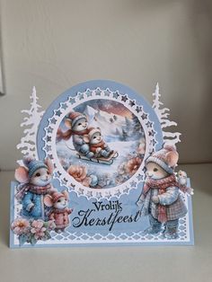 a christmas card with two mice on it