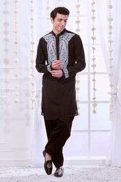 Black straight kurta with contrasting white paisley pattern dori embroidered bodice and cuffs. Comes with solid pyjama. - Aza Fashions Black Bollywood Kurta With Embroidered Border, Luxury Black Kurta With Embroidered Border, Black Cotton Kurta With Embroidered Border, Black Embroidered Jamawar Kurta, Black Semi-stitched Jamawar Kurta, Kurta Set Men, Dori Work, Black Kurta, Men Kurta