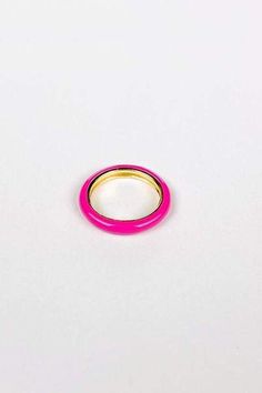 The Axel Pink Enamel Ring is the perfect ring to add to your jewelry set.  It features a beautiful hot pink that would look striking with a colorful floral midi dress.  The gold inner lining adds that extra bit of flair that will make the ring a staple in your style. Materials & Care:  14k Gold over 925 Sterling Silver Hypoallergenic and Water Resistant Use a soft microfiber or jewelry cloth to clean Store separate from other jewelry to avoid scratching Avoid direct contact with lotions, per Mens Pink Rings, Pink Open Enamel Ring, Pink Enamel Open Ring, Pink Enamel, Enamel Ring, Pink Ring, Floral Midi Dress, Perfect Ring, Jewelry Set