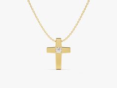 Embrace the power of faith in a minimalist way with the Small Cross Necklace. This understated piece features a delicate cross pendant, perfect for everyday wear and layering. Crafted from gleaming precious metal, the cross serves as a constant reminder of your faith, even when close to your heart. The small size ensures this necklace offers a touch of faith without overwhelming your outfit. It's perfect for those who prefer minimalist jewelry or for everyday wear. FEATURES• Made to Order• Gold Elegant Everyday Yellow Gold Cross Necklace, Elegant Yellow Gold Cross Necklace, Minimalist Yellow Gold Cross Pendant Necklace, Minimalist Yellow Gold Cross Necklace, Small Cross Necklace, Cross Pendant Men, Aquarius Gifts, Rutilated Quartz Ring, Signet Ring Men