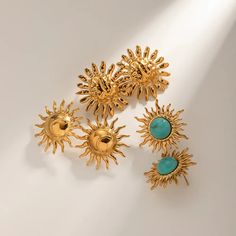 Elevate Your Style with Exquisite Elegance Indulge in the radiance of our 18k Gold Plated Turquoise Inlay Sunflower Dangle Earrings, meticulously crafted to captivate attention and elevate your ensemble to unparalleled heights. With a stunning sunflower shape adorned with turquoise accents, these earrings exude a timeless charm that effortlessly complements any occasion. Unmatched Quality and Durability Handcrafted from premium stainless steel and adorned with a luxurious 18k gold plating, our earrings boast exceptional durability and longevity. The high-quality materials ensure resistance to fading and scratching, guaranteeing a lustrous finish that withstands the test of time. Plus, our waterproof design ensures worry-free wear, allowing you to shine bright even on rainy days. Embrace Ve Wedding Types, Flower Ear, Turquoise Accents, Ear Clips, Waterproof Jewelry, Sunflower Design, Stylish Earring, Earrings Statement, Gold Earrings Dangle