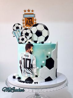 a soccer themed birthday cake on a table