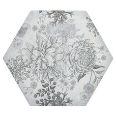 a white and gray floral pattern on a hexagonal tile wallpaper with flowers