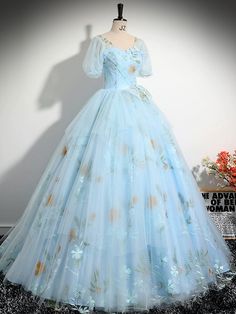 Blue Princess Style Floor-length Gown, Spring Princess Style Blue Ball Gown, Light Blue Princess Dress For Debutante Ball, Spring Blue Ball Gown Dress, Blue A-line Ball Gown For Debutante Ball, Blue Dress For Spring Quinceanera, Blue Dress For Quinceanera In Spring, Blue Ball Gown For Spring, Blue Spring Quinceanera Dress