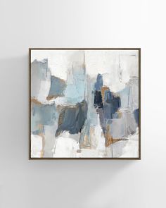 an abstract painting hanging on the wall