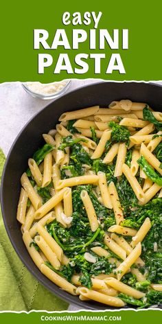 pasta with spinach and pesto in a skillet