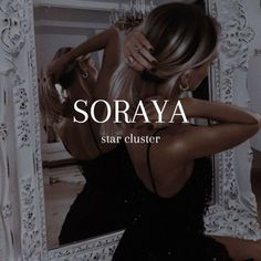 a woman standing in front of a mirror with her hand on her hip and the words soraya star cluster