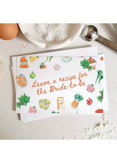 there is a card that says leave a recipe for the bride - to - be