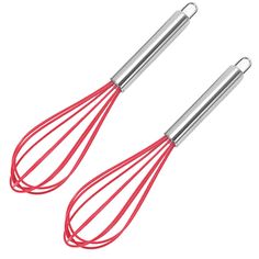 two red wire whisks sitting on top of each other