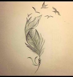 a pencil drawing of a feather and some birds flying by on the side of a wall