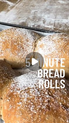 several loaves of bread sitting on top of a baking sheet with the words 50 minute bread rolls