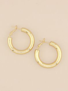 Hoop earrings Gold-filled wide tube hoops. Hoop size is 30.5mm and 6mm wide. Sold in pairs. Custom Bangle, Trending Bracelets, Hoop Earrings Style, Chunky Earrings, Trending Necklaces, Earring Trends, Summer Bracelets, Summer Earring, In Pairs