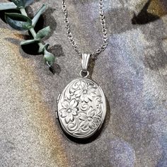 Ross-Simons - Single Initial - 14kt White Gold Floral Locket Necklace. 18". Etched with a scrolling floral motif, our 14kt white gold oval locket necklace has the aura of a vintage-style keepsake. Make it meaningful with a FREE engraving on the back of a single initial in your choice of block or script type. Fits a 7/16" x 5/8" photo inside. Suspends from a rope chain. Satin and polished finishes. Springring clasp, 14kt white gold personalized floral locket necklace. Oval Locket Necklace, Locket Necklace Vintage, Oval Locket, Vintage Lockets, Script Type, Gold Floral, Locket Necklace, Rope Chain, Floral Motif