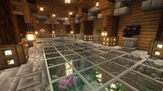 a large room filled with lots of windows and lights on the ceiling in minecraft