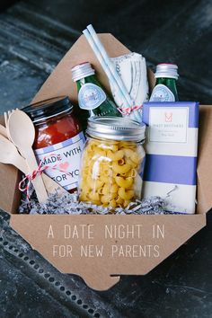 a box filled with pasta and condiments on top of a table