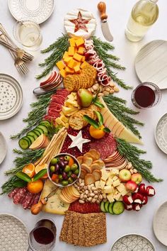 a christmas tree made out of different types of food