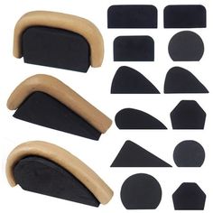 various pieces of black foam with wooden handles