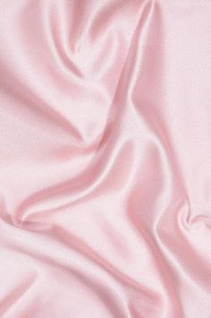 Characterized by glossy sheen on both sides, the double face satin is heavier in weight than the single face satin, yet maintains the beautiful, smooth finish. Our heavy-weight, luxurious Rose Pink Double Face Duchess Satin Fabric is made of natural silk fibers, and is used primarily for bridal dresses and evening wear. The fabric is sold by the Yard, and measures 54 inches in width. Matric Dress, Silk Fabric Dress, Silk Wallpaper, Duchess Satin, Pretty Pins, Natural Silk, Powder Pink, Pink Silk, Pink Satin