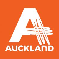 an orange and white logo with the word,'auckland'on it