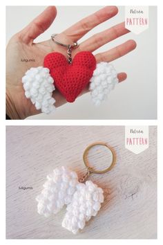 crocheted keychain with heart and angel wings on it, attached to a hand