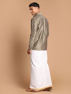 VASTRAMAY Men's Brown Silk Blend Printed Shirt And Mundu Set Experience traditional elegance with the VASTRAMAY Men's Brown Silk Blend Printed Shirt And Mundu Set. Crafted from luxurious silk blend fabric, this set offers a comfortable fit and a sophisticated look, perfect for special occasions. Features Includes a brown silk blend printed shirt Comes with a matching Mundu Traditional yet stylish design Specifications Material: Silk blend Color: Brown Sizes Available: S, M, L, XL Material & Care Classic Long Sleeve Festive Traditional Wear, Traditional Festive Shirt For Formal Occasions, Formal Long Sleeve Silk Kurta, Semi-formal Silk Shirt, Festive Semi-formal Long Sleeve Shirt, Traditional Long Sleeve Festive Shirt, Classic Long Sleeve Traditional Wear For Eid, Formal Long Sleeve Tops With Pallu, Long Sleeve Formal Tops With Pallu