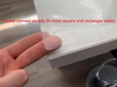 a hand holding a piece of clear plastic with the words round corners usually fit most square and rectangle tables