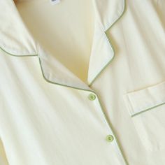 Indulge in comfort and fashion with Ever Lasting's Key Lime Cotton Short Sleeves and Short Pajama Set. Made with soft, breathable material, this set flawlessly blends timeless sophistication with comfortable loungewear. The classic pattern on the short sleeved top adds an elegant touch, while the coordinating shorts provide breezy ease for balmy nights or laid-back mornings. Enjoy ultimate relaxation after a busy day or during a leisurely weekend with this pajama set that offers both coziness and style. Features: 100% Cotton Relax Fit (stretchy waistband) Breathable (great for all seasons) Machine Safe General Size Guide: Size S/M -> Size 0 - 4 Size M/L-> Size 4 - 8 Size L/XL -> Size 8 - 12 Looking for more coziness? Shop our loungewear collection. Green Pajama Set, Green Pajamas, Pajama Pillow, Shorts Pajama Set, Comfortable Loungewear, Bedding Essentials, Stylish Beds, Key Lime, Short Pajama Set