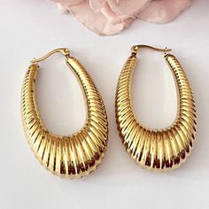 These beautiful hoop pierced earrings are vintage from the 1980s. Gorgeous 14k gold plated large statement earrings. Length: 5cm. Width: 1.2cm. www.vintageamara.co.uk Hypoallergenic: The hypoallergenic property of stainless steel ensures that you can wear your jewelry without worries, even if you have sensitive skin. Water Resistant: Our finishes allow you to expose your everyday jewelry to water while keeping their shine and finishes intact. 14k Gold Plating: If you want a piece of jewelry that Gold Hat, Large Statement Earrings, Hard Metal, Sans Souci, Pierced Earrings, Everyday Jewelry, Gold Plated Jewelry, The 1980s, Jewelry Earrings Studs