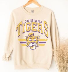 Retro Louisiana Football Shirt, LSU Football Sweatshirt, Louisiana-Tigers Mascot shirt, Gift For Fans, NCAA Football shirt in tan Football Sweatshirt, Ncaa Football, Football Shirts, Louisiana, Ncaa, Football, Sweatshirts