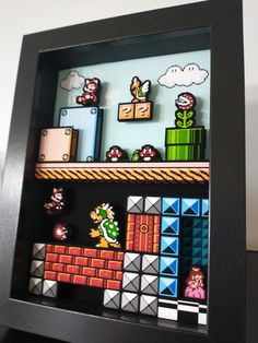 an image of a video game display in a black frame with mario and luigi on it