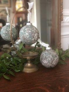 some ornaments sitting on top of a wooden table