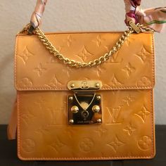 - Rare Vintage Piece In Great Condition With Clochette And 2 Keys - No Cracks On Top Handle Vanchetta Still Light But Have Covered With A Twilly To Preserve Condition - Monogram Vernis With Some Discoloration And Very Superficial Cracks On Leather - Price Includes A Generic Gold Chain That Can Be Turned Into A Crossbody Or Shoulder Bag - No Tears In The Interior, Some Bubbling From Storage/Use Poshmark Authenticates For Free For Purchases More Than $500! Louis Vuitton Mini Bag, Louis Vuitton Mini Pochette, Louis Vuitton Favorite Mm, Louis Vuitton Felicie, Louis Vuitton Pallas, Louis Vuitton Favorite, Louis Vuitton Pochette Metis, Monogram Handbag, Louis Vuitton Pochette