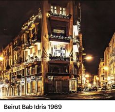 an image of a building that is lit up at night with the words bertt baldris 1909 on it