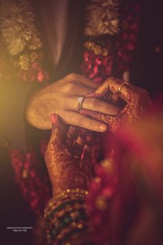 a close up of a person's hands holding something