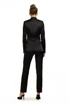 Women who wear black lead colorful lives. Sleek Long Sleeve Fall Suits, Black Suit For Fall Workwear, Black Single-breasted Suit For Fall, Black Fitted Long Sleeve Suit, Fitted Black Long Sleeve Suit, Black Fitted Tuxedo Outerwear, Fitted Black Tuxedo Outerwear, Fitted Black Suit For Fall, Tuxedo Style Long Sleeve Outerwear For Work