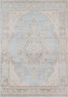 an area rug with blue and beige colors