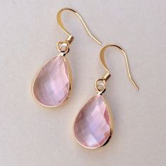 Gorgeous Earrings New In Excellent Condition 1.5” L Total With Gold Plated Ear Wires, 0.4”W Gold Plated Metal Pear Shape Bezel Pink Rose Tone Faceted Quartz Stones 18mm-11mm Beautiful, Not Heavy, Many Compliments Guaranteed Fast Shipping. & Anthropologie Gift Bag New 10”-8”-5” Bundle Up And Save Even More Pink Hypoallergenic Drop Jewelry, Pink Teardrop Earrings For Gift, Pink Rose Quartz Jewelry With Matching Earrings, Pink Teardrop Jewelry For Gifts, Pink Teardrop Jewelry For Gift, Pink Rose Quartz Jewelry With Ear Wire, Pink Rose Quartz Drop Earrings, Pink Rose Quartz Jewelry For Party, Pink Rose Quartz Party Jewelry