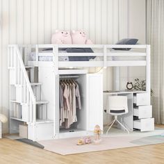 there is a bunk bed with stairs to the top and bottom level, next to a desk