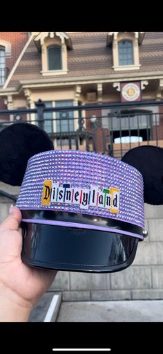 Rhinestone Conductor Mickey Ear Hat Collectible and Wearable Hat upcycled for a modern wear. A conversation piece that will have everyone stopping you or the perfect piece to have displayed. This item is handmade. May have some minor cosmetic imperfections or differences that make each piece unique, but all made with love. Mickey Ear Hat, Conductor Hat, Ear Hat, Modern Wear, Ear Hats, Mickey Ears, Conversation Piece, Trucker Cap, Disneyland