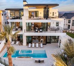 an aerial view of a house with a swimming pool