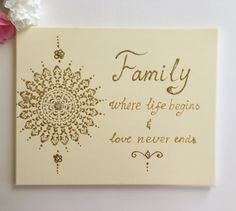 a card with the words family where life begins and love never ends written on it