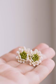 Pretty pale pink stud earrings for a shabby chic look. Stainless steel earrings with backs (ear nuts) included. These are hypoallergenic and suitable for most sensitive ears. FEATURES: * entirely handmade, no molds are used * made of durable polymer clay * unique and one-of-a-kind, each one is different * realistically natural looking * will arrive in a gift box * soft pink colors o Other colors available, please just ask Handmade Cream Flower Earrings, Handmade Cream Flower Earrings For Gift, Handmade White Botanical Earrings, White Flower Cluster Earrings, Delicate Green Flower Earrings, White Botanical Birth Flower Earrings, Botanical White Birth Flower Earrings, Green Dahlia, Pink Flower Earrings