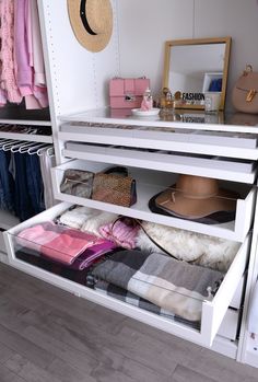 an organized closet with shoes, handbags and purses on the shelf next to it