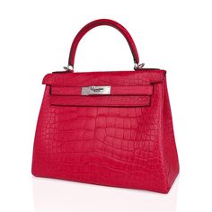 Guaranteed authentic Hermes Kelly 28 bag featured in rich jewel toned Rose Extreme matte alligator. This iconic vibrant pink Hermes bag is timeless and chic. Fresh with palladium hardware. This gorgeous Hermes Kelly bag is a perfect year round beauty.Comes with shoulder strap, sleepers, lock, keys and clochette, raincoat and signature Hermes box.NEW or NEVER WORN.Mightychic shares your passion for exquisite and whimsical Hermes creations and provides you access to that one single item, or to bui Elegant Pink Crocodile Pattern Shoulder Bag, Pink Hermes Bag, Pink Hermes, Designer School Bags, Hermes Kelly Bag, Hermes Kelly 28, Handbag Collection, Hermes Box, Future Outfit