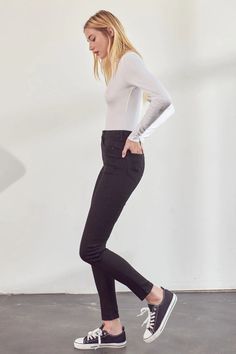 Details: 9.5" Rise / 29.5" Inseam 66.4% Cotton, 28.3% Polyester, 3.6% Rayon, 1.7% Spandex Stretchiness Level >> Super Stretch Our Paris High Rise Jeans come in a super skinny cut that contours the body creating a silhouette enhancing fit. Sits above the natural waistline as it tapers down the leg leaving a skin-tight finish that complements any fit. Made with super-stretch denim that's flexible and durable, maintaining its shape even after multiple wears. Features a classic five-pocket design, s High Rise High Stretch Black Bottoms, Black Elastane Jeans For Fall, Black High-waist High-stretch Jeans, Black High Waist High Stretch Jeans, Edgy Stretch Jeans For Fall, High Waist High Stretch Black Jeans, High Rise Fitted Black Jeans, Winter Straight Leg Jeans For Night Out, High Waist Black Jeans With High Stretch