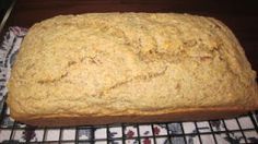 a loaf of bread sitting on top of a cooling rack