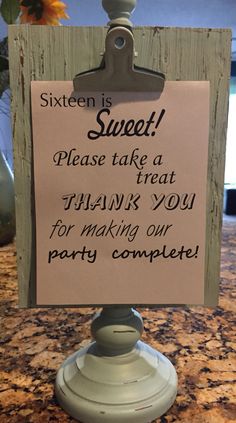 a sign that says sixteen is sweet please take a treat thank you for making our party complete