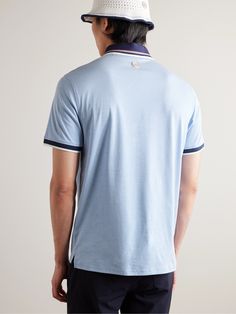 DESIGNED BY MR PORTER. Created in collaboration with G/FORE, Mr P.'s polo shirt is made from technical piqué that's comfortable, flexible and sweat-wicking. It's cut in a neat profile and has striped ribbed trims for a classic, sporty finish. Rest assured, it will look the part for the nineteenth hole, too. 50% of the Profits* from the sale of this item until 23:59 GMT on 14th May 2024 will be donated to the MR PORTER Health In Mind Fund powered by Movember to support men’s mental and physical … Casual Golf Polo T-shirt, Ralph Lauren Blazer, White Moisture-wicking Golf Polo Shirt, Functional Moisture-wicking Golf Polo Shirt, Mr P, White Shoes Sneakers, Moisture-wicking Short Sleeve Golf Polo Shirt, Cotton Golf Polo Shirt With 4-way Stretch, Workout Essentials