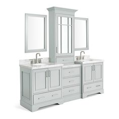 a white bathroom vanity with two sinks and mirrors on the top, along with an extra medicine cabinet